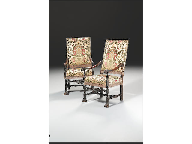 A pair of late 17th century Flemish walnut Open Armchairs, in the Louis XIII style,