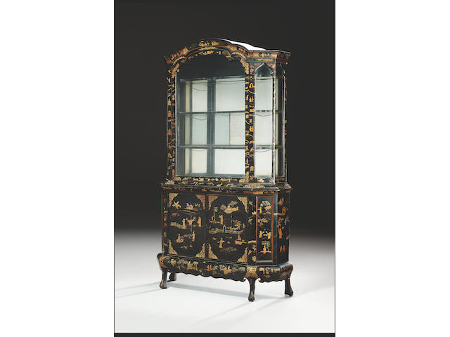 A late 18th century Chinese export black laquer and chinoisserie decorated China Cabinet in the Dutch taste,