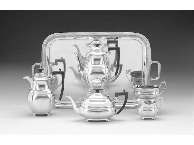 A silver five piece tea and coffee service with two-handled tray, by Mappin & Webb, Sheffield 1945,