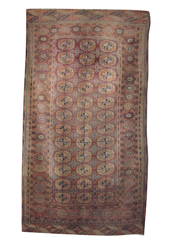 A Tekke long rug, West Turkestan, 251cm x 145cm