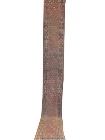 A long and narrow Hamadan district runner, West Persia, 625cm x 78cm