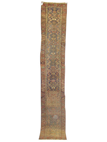 A long and narrow Heriz runner, North West Persia, 502cm x 86cm,
