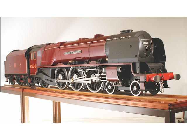 An outstanding exhibition quality 7 1/4" gauge model of the William Stanier London Midland and Scottish Railway 'Pacific' 4-6-2 locomotive and tender No. 6230 'Duchess of Buccleuch' built by John Adams, 21" x 114" (533mm x 289mm)