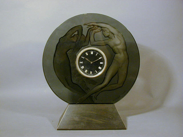 Ren&#233; Lalique, design 1926 'Le Jour et La Nuit', A Smokey Grey Clock 37.5cm high, etched 'R.Lalique France'