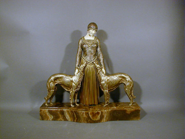 Dimitri Chiparus, circa 1920 'Les Toujours des Amis', A Gilt Bronze and Carved Ivory Group 41cm high, 43cm long, signed on base