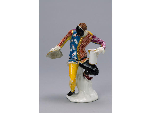 A Rare Meissen Figure of Harlequin with a Jug circa 1740