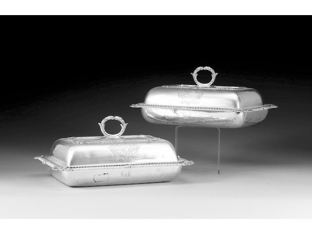 A pair of George III silver entr&#233;e dishes and covers, by I. E. Terrey, London 1815,