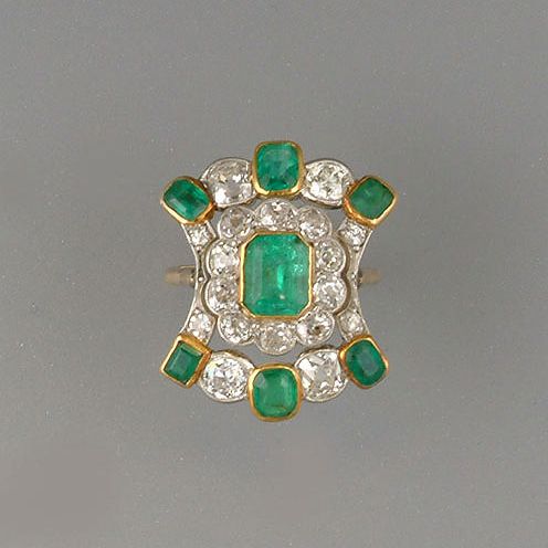 An emerald and diamond ring,