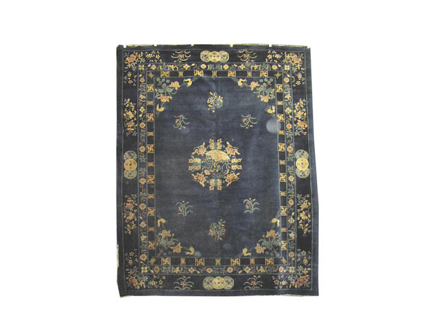 A Peking carpet, China, 350cm x 284cm
