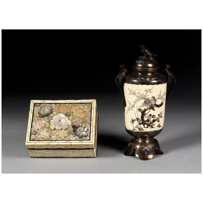 A silver-mounted ivory vase and cover,