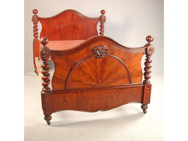 A Victorian mahogany bed 191 cm. long x 150 cm. wide x 139 cm. high