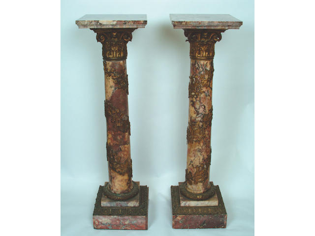 A pair of 19th Century French breche violette pedestals,