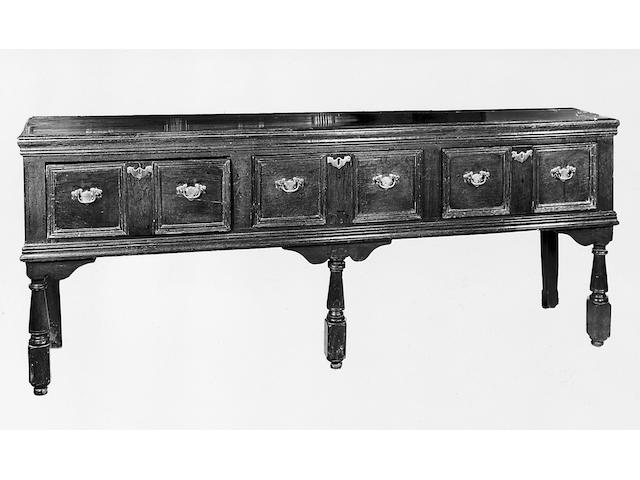 An 18th century oak dresser base