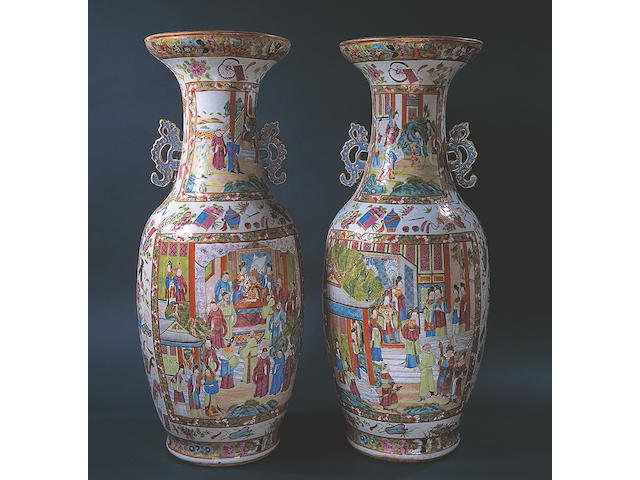 A pair of Qing dynasty, 19th century, cantonese famille rose large vases, 63.5cm. high