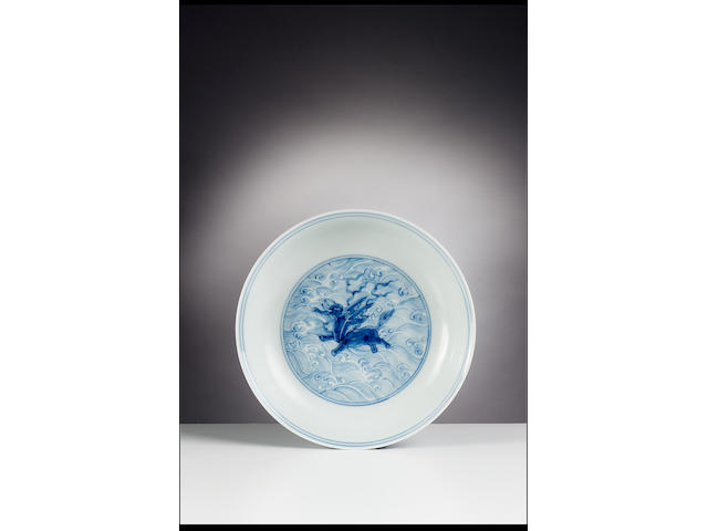 A blue and white saucer dish with flying elephant (P56)
