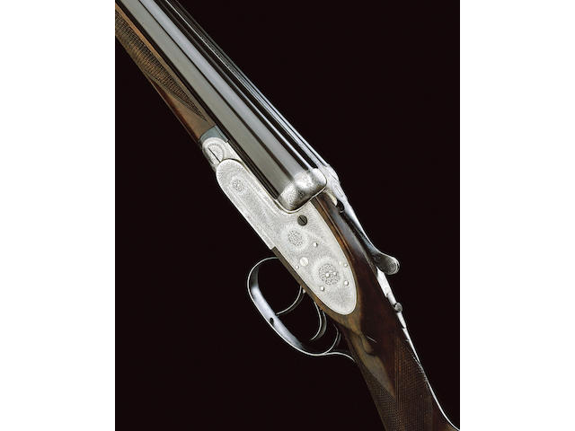 A 12-BORE SELF-OPENING SIDELOCK EJECTOR GUN BY J. PURDEY, NO. 20525 In a leather lightweight case with J. Purdey trade-labels