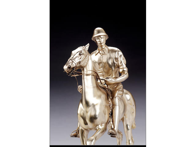 Polo interest:- A set of nine Edwardian equestrian statuettes forming a polo game, by Mappin & Webb, 1903/04,