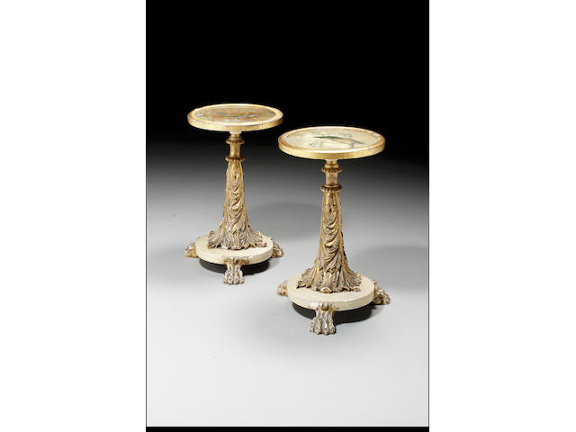 A pair of mid 19th Century parcel gilt occasional tables, 37cm. diameter, 61cm. high
