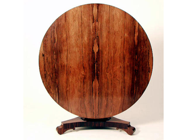 An early Victorian rosewood loo table, 128cm diameter.