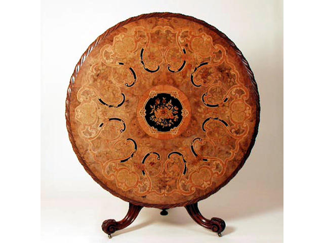 A mid Victorian walnut and marquetry centre table 135cm diameter