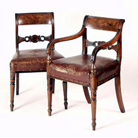 A set of seven Regency mahogany dining chairs,