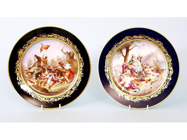 A set of four French Sevres style porcelain plates, late 19th / early 20th Century, 23.8cm diameter, two damaged, (4). See Illustration.