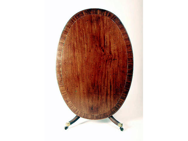 A Regency mahogany Sheraton style breakfast table, 154cm wide. See Illustration.