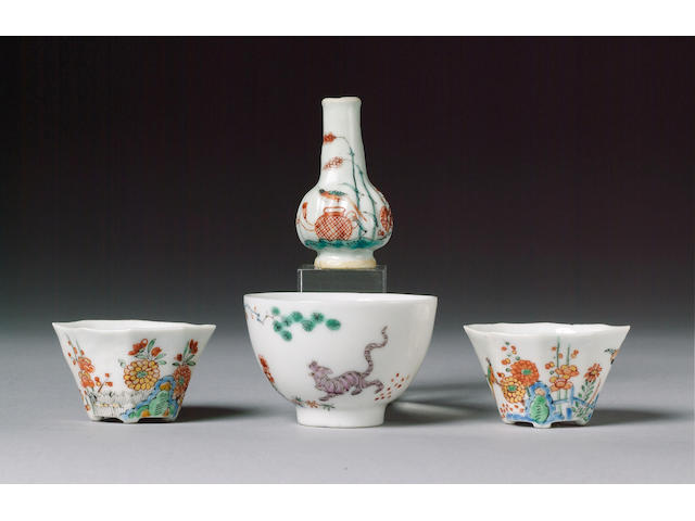A teabowl, two miniature libation cups and a toy vase circa 1720-30