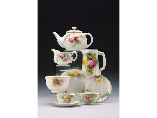 A Royal Worcester James Hadley tea service, circa 1907, three pieces signed by Kitty Blake