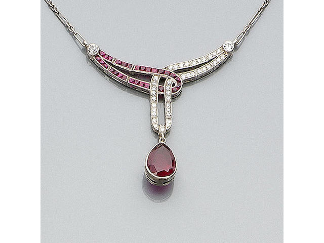 A ruby and diamond pendant