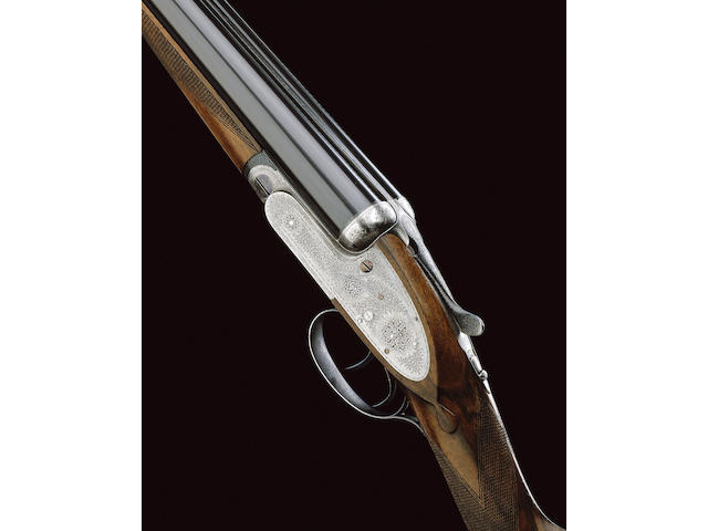 A 12-BORE SELF-OPENING SIDELOCK EJECTOR GUN BY J. PURDEY, NO. 15459 In its brass-mounted oak and leather case
