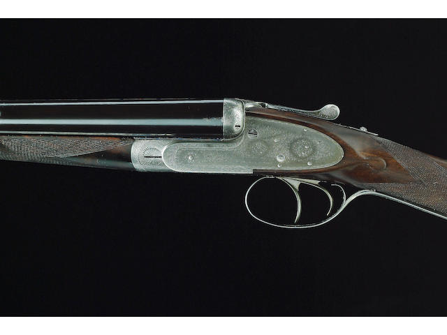A 12-BORE SELF-OPENING SIDELOCK EJECTOR GUN BY J. PURDEY, NO. 17194 In a leather-mounted canvas case