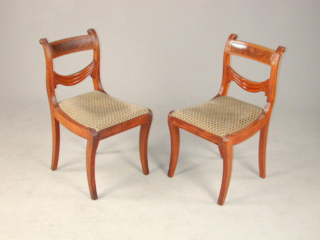 A set of eight Regency dining chairs