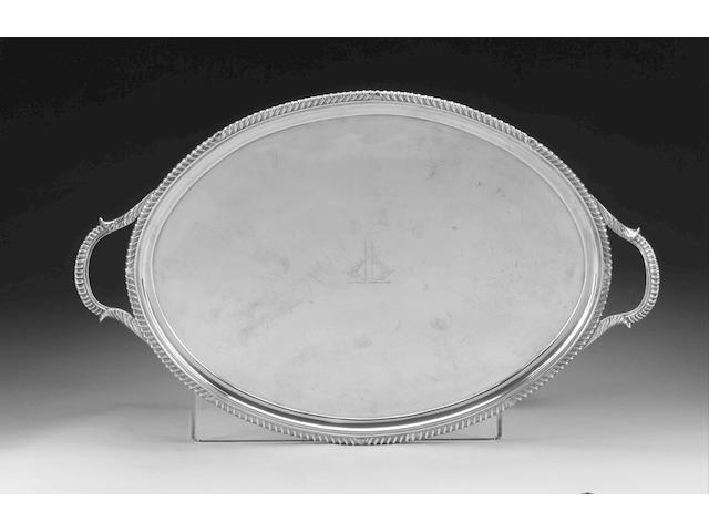 A George III silver two-handled oval tray, maker's mark "IM", London 1813, also with French touch mark,