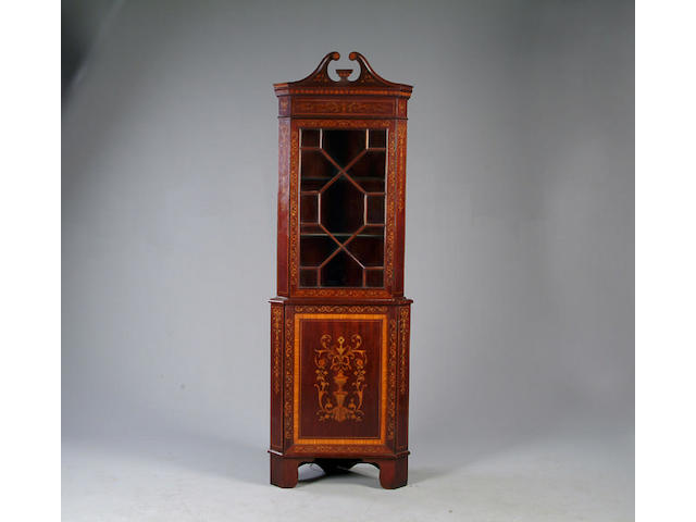 An Edwardian marquetry two tier corner display cabinet