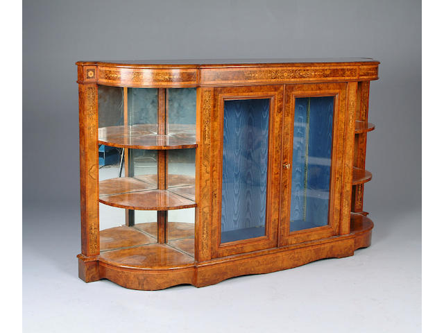 A Victorian walnut credenza with two glazed doors,