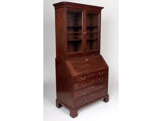 A George III mahogany bureau bookcase, top and base associated,