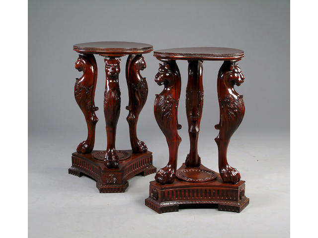 A pair of Regency style mahogany pedestal tables