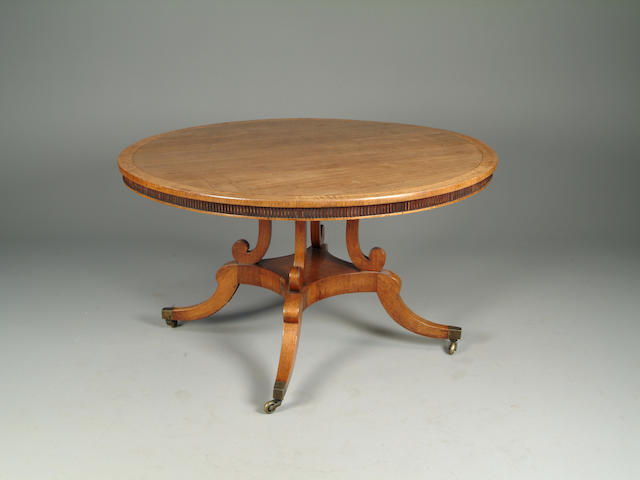 A William IV rosewood and satinwood crossbanded breakfast table