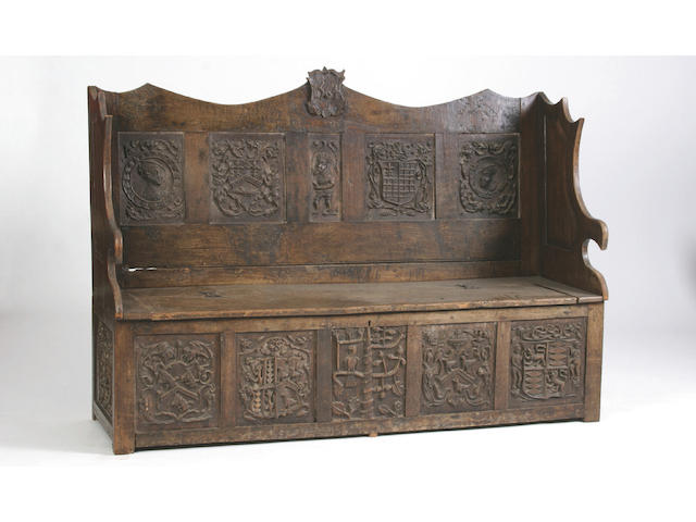 A 19th Century oak hall box settle,