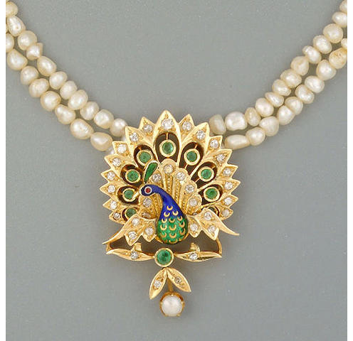 An enamel and gem-set peacock pendant