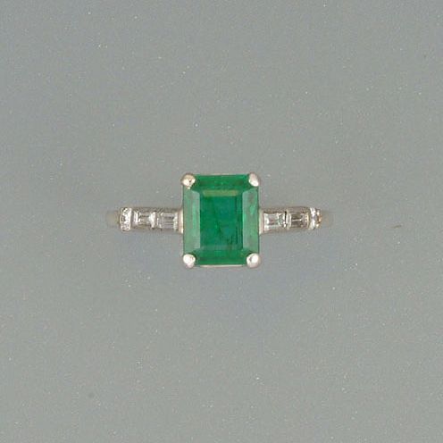 An emerald single-stone ring