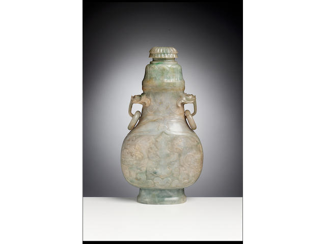 A green and white jadeite archaistic vase and cover 19th Century