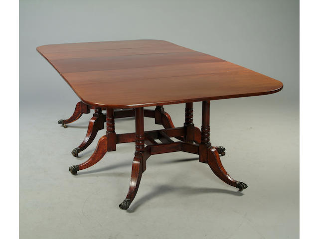 A George III mahogany Cumberland action dining table