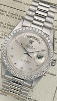 Rolex. A fine and rare platinum and diamond set automatic centre seconds calendar watch "Day-Date" Ref:1804, 1960s