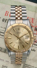 Rolex. A steel and gold automatic calendar watch'Thunderbird' Ref:6609, circa 1958