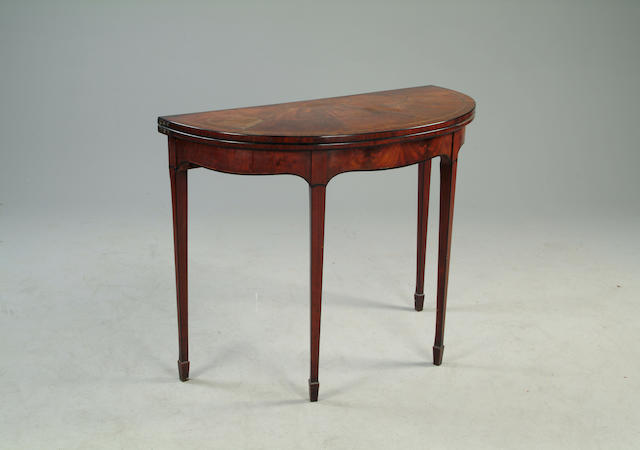 A George III mahogany demi-lune card table