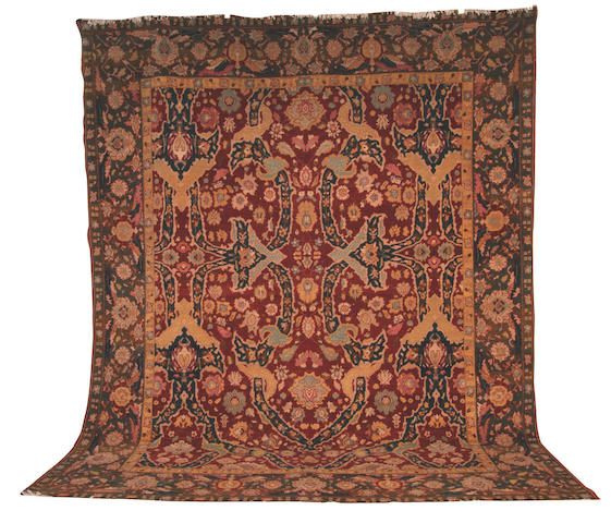 An Agra design carpet, 393 cm. x 322 cm.