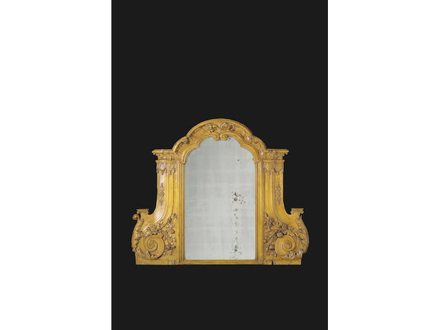 An early 18th century continental fruitwood overmantel mirror