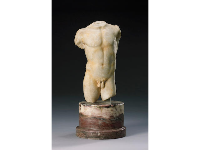 A Roman marble torso, on plinth, Circa 1st Century A.D.